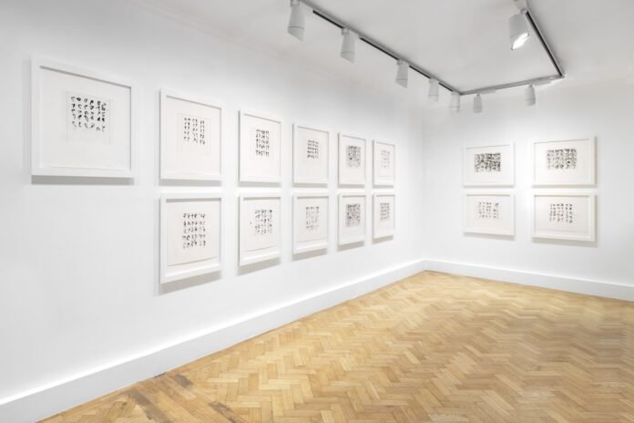 Installation view of Brice Marden’s Etched Letters exhibition at Gagosian Burlington Arcade in London, showing framed abstract calligraphic works displayed on white walls.